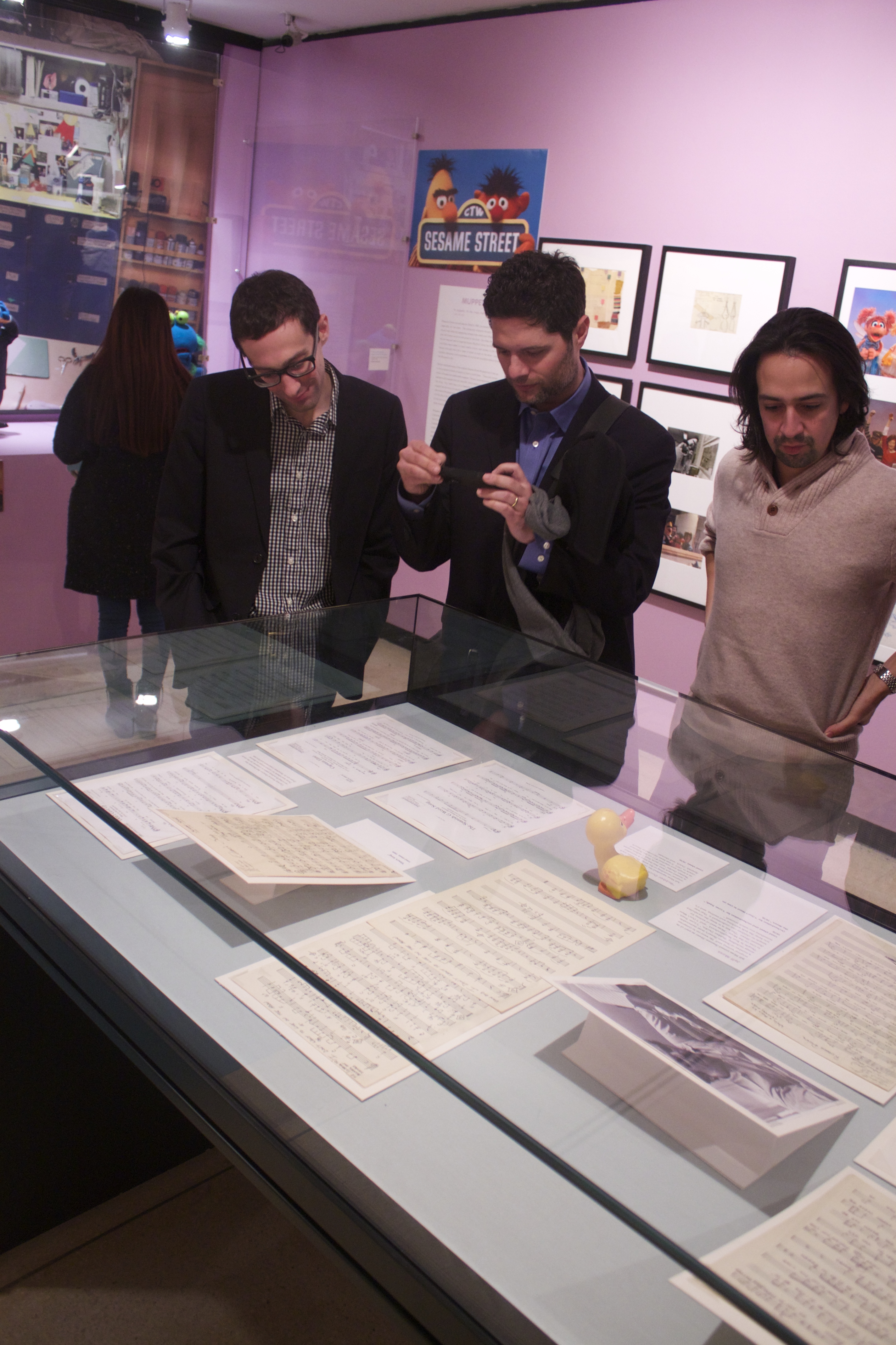 Songwriters Lin-Manuel Miranda and Tom Kitt, with reporter Michael Schulman look at the case of lead sheets.